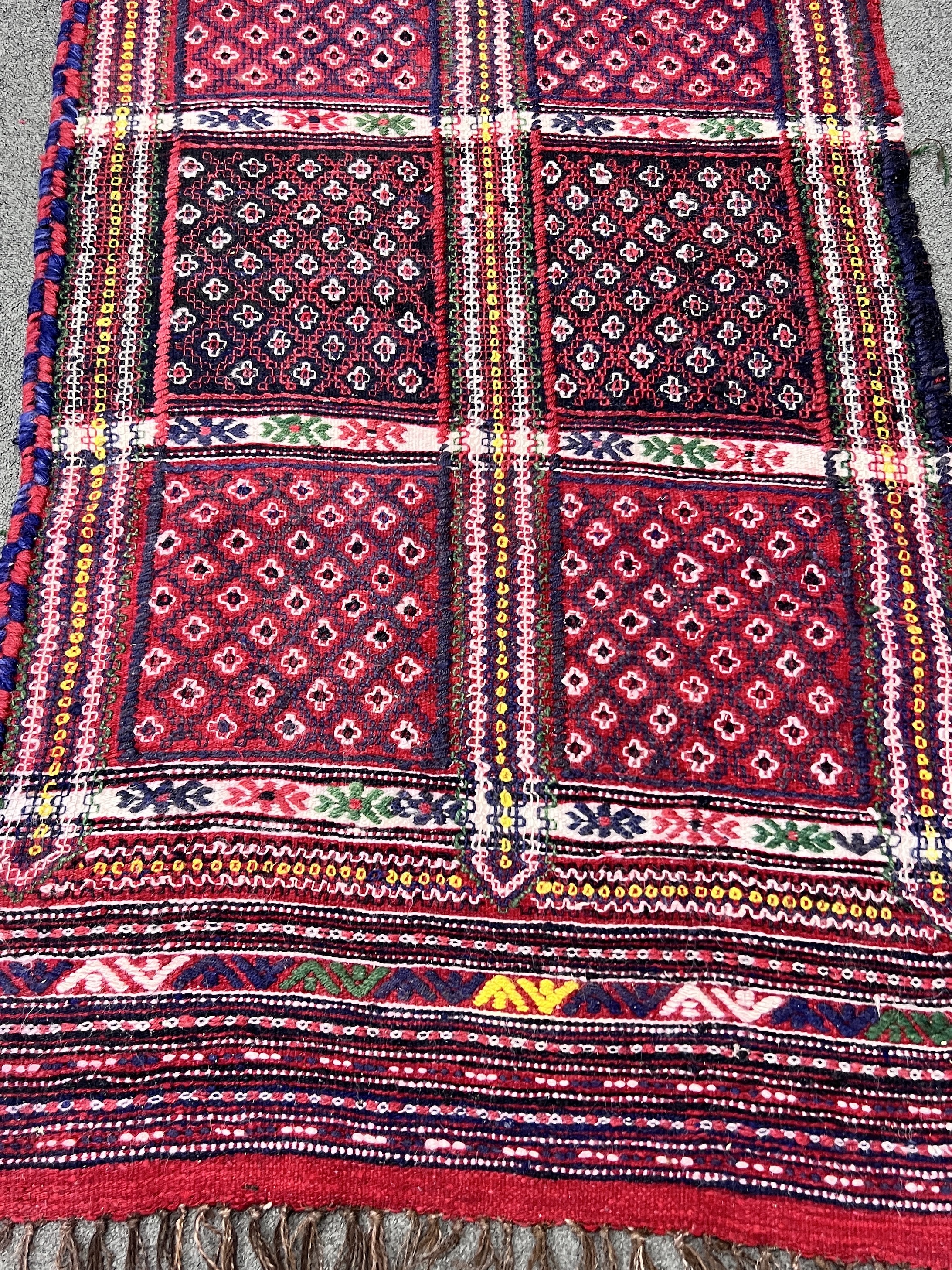 A Kilim flatweave runner, 284 x 77cm